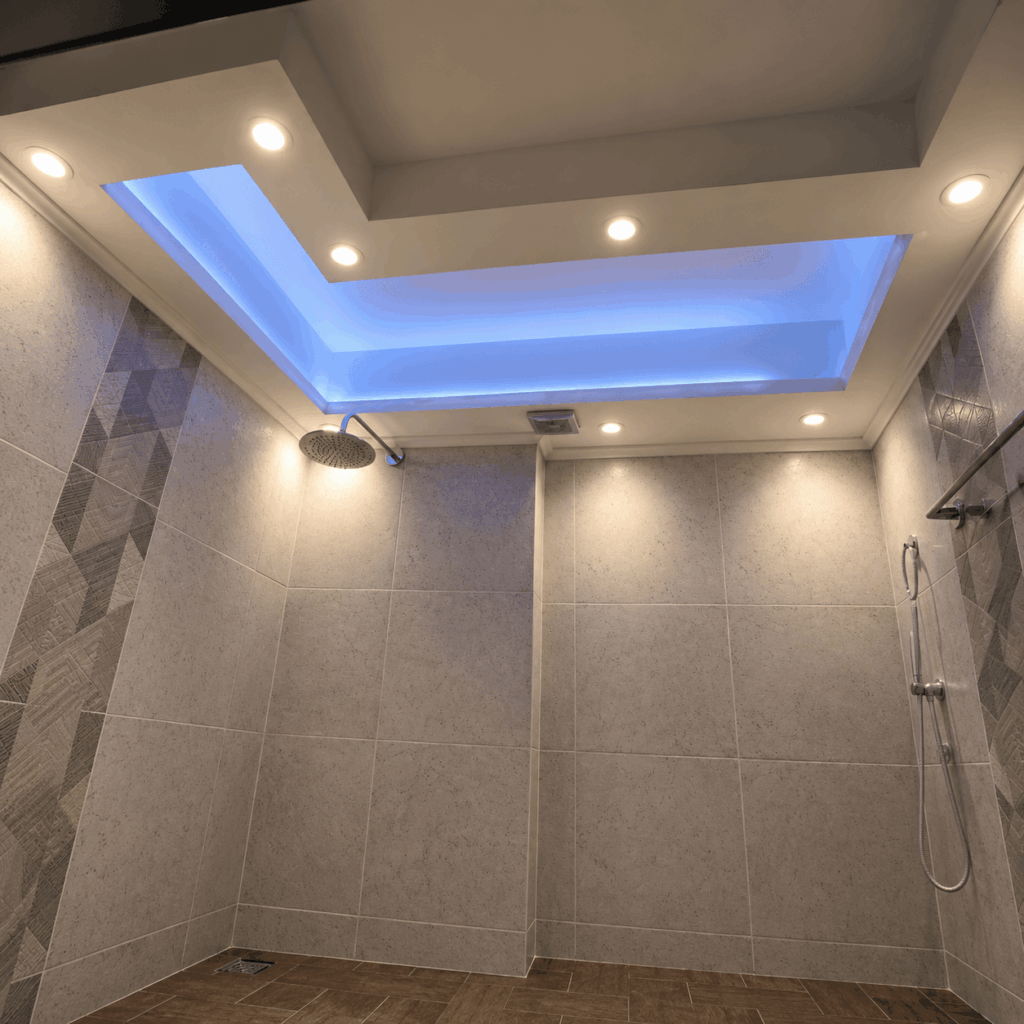 baño premium con cielo flotante e iluminación LED
